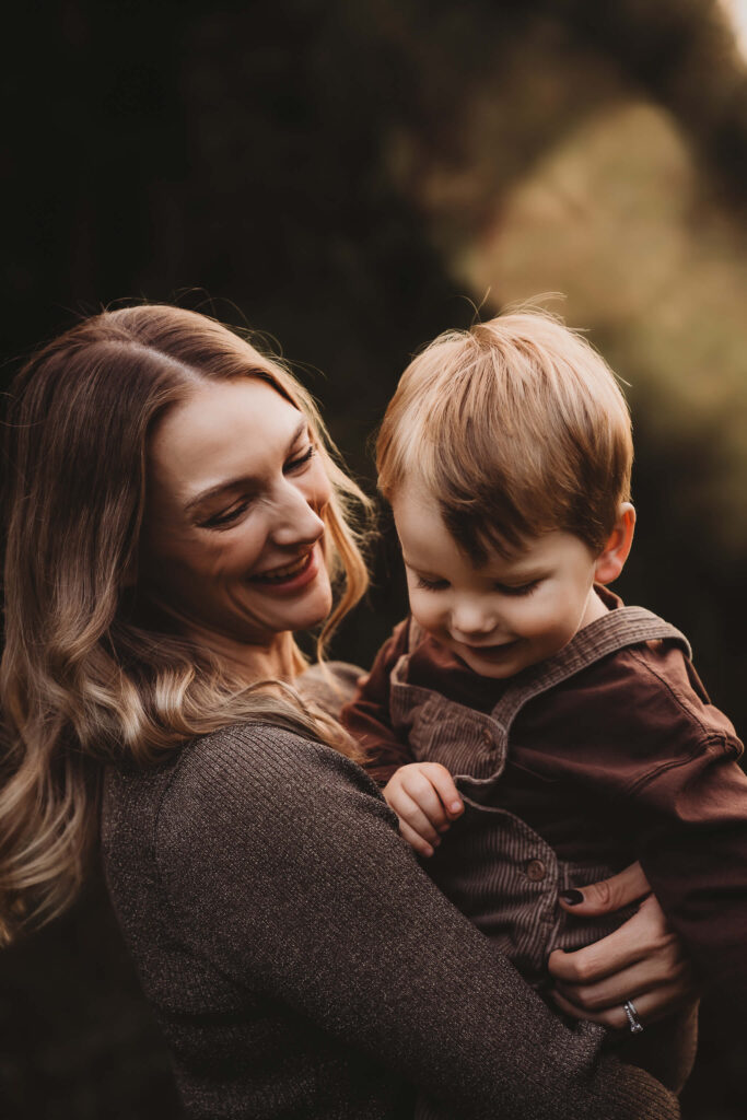 mother with son during golden hour photoshoot in the woodlands, texas