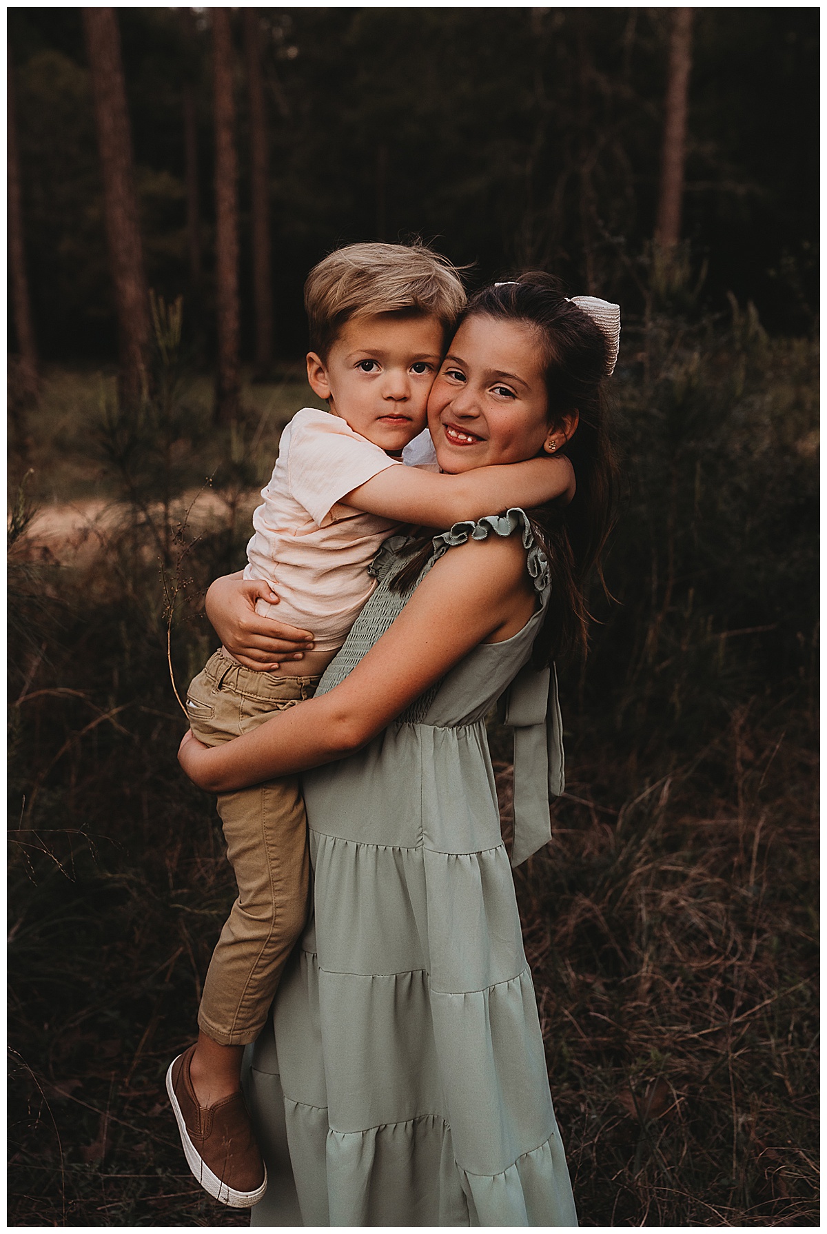 Kids hold each other close showing Why You Should Coordinate Outfits Instead Of Matching For Your Family Photos 