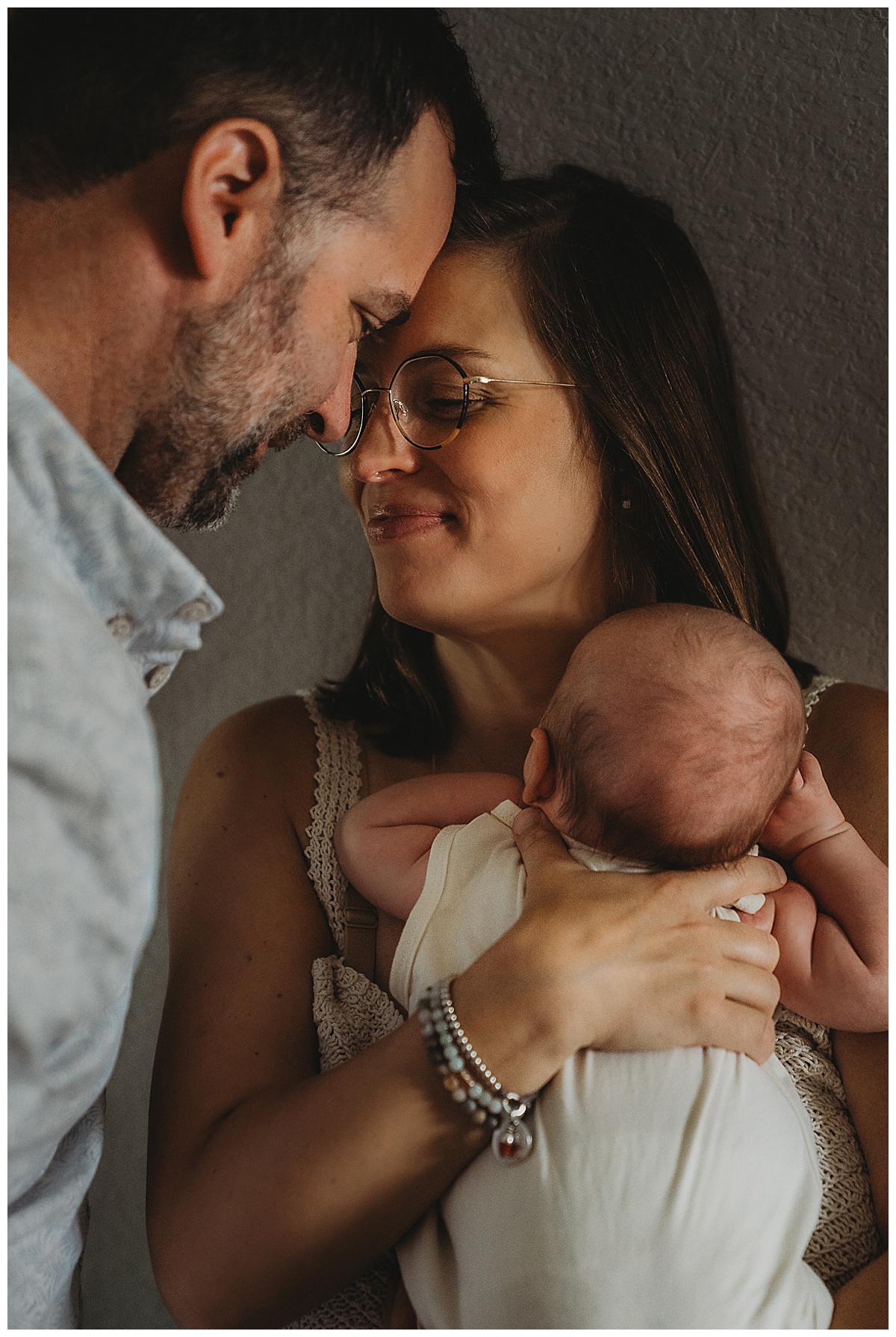 Parents stand together for The Woodlands Family Photographer