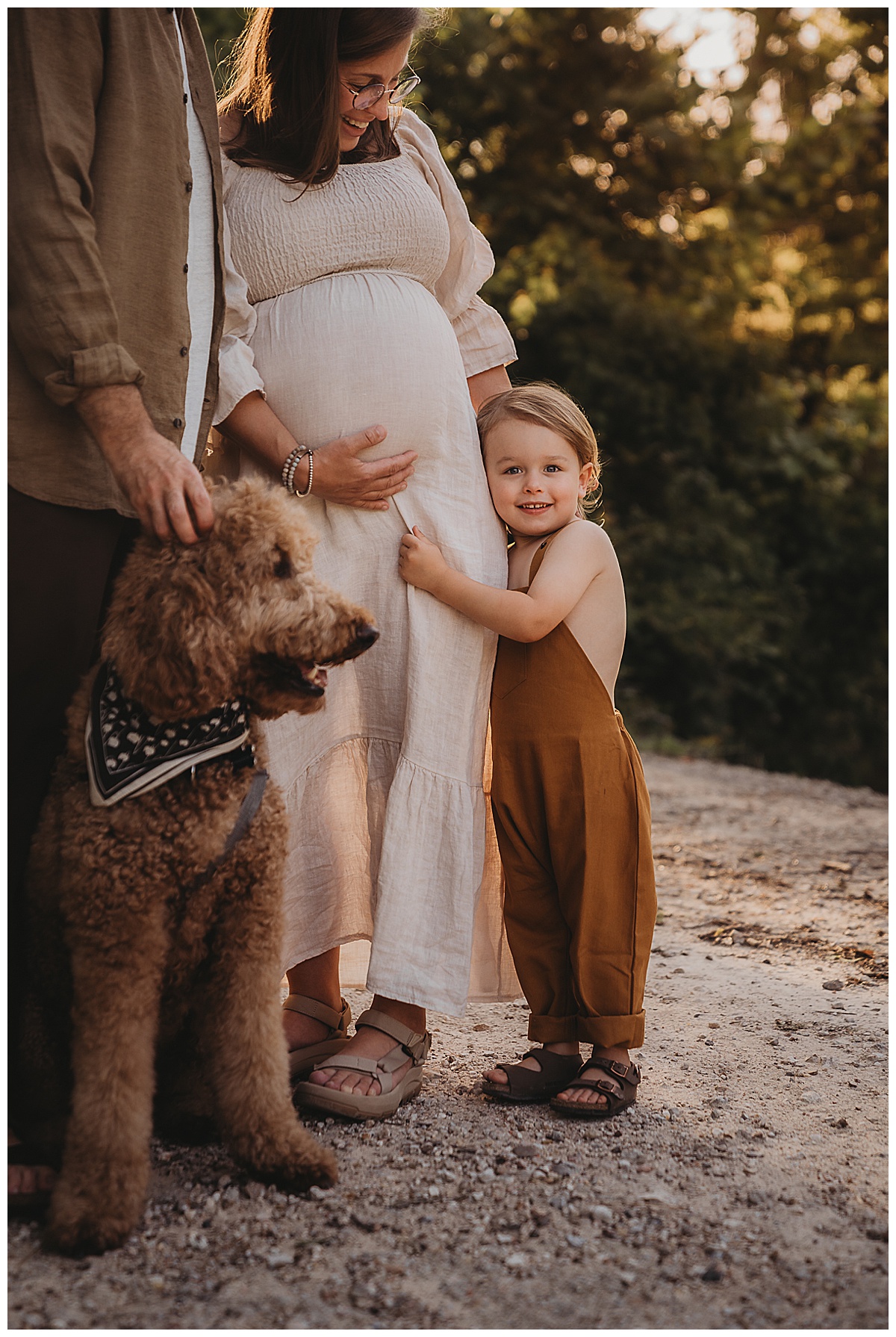 Young child hugs mom for Maria Grace Photos