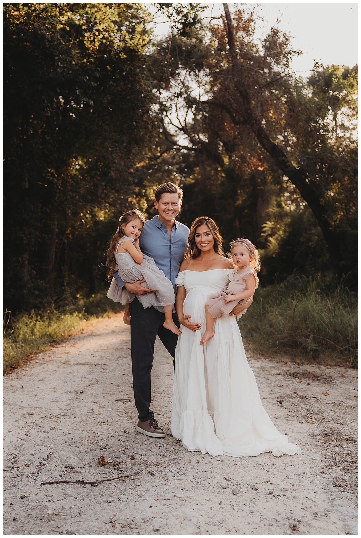 Family smile together showing the Perfect Time for Maternity Photos