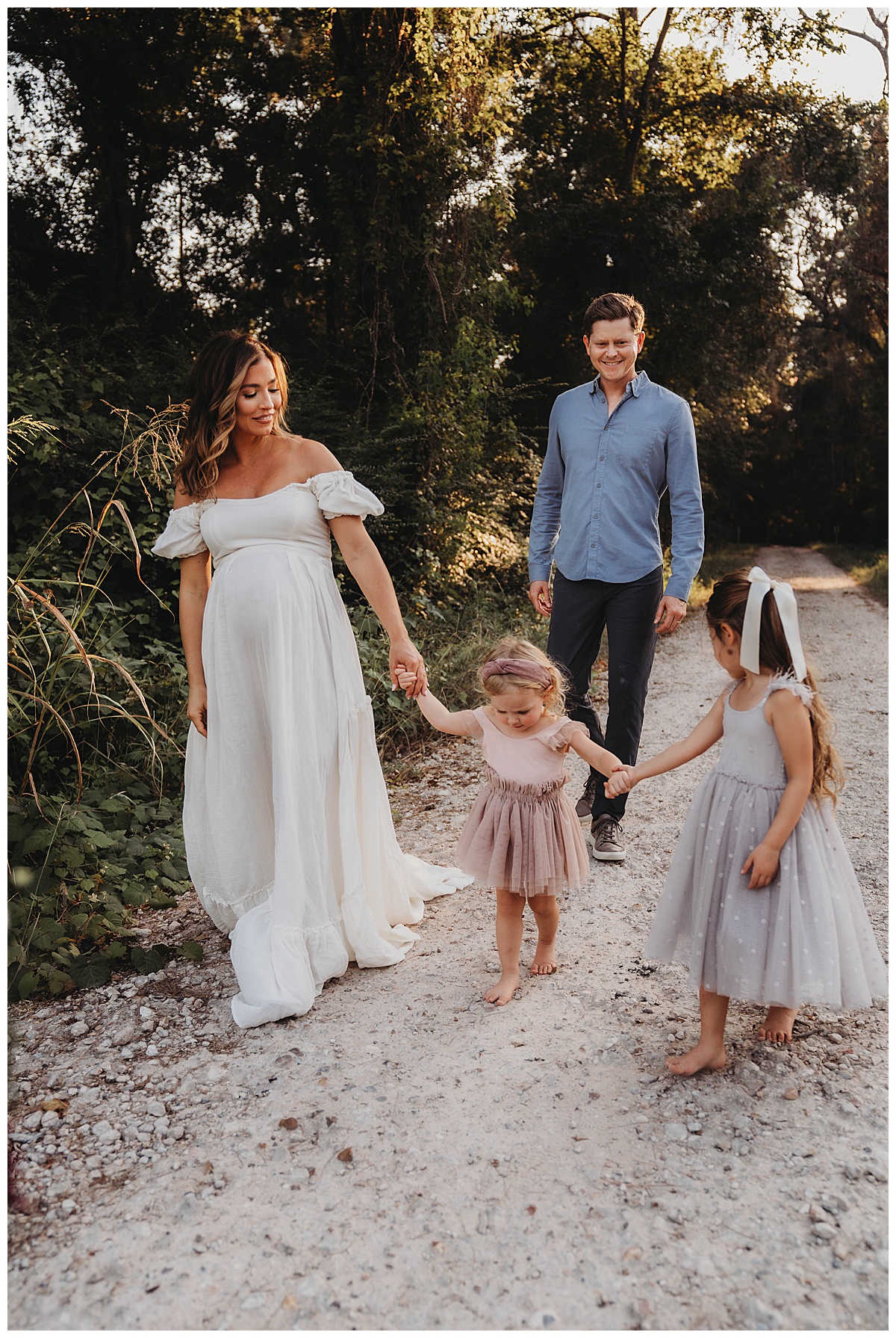 Parents walk with kids smiling together showing the Perfect Time for Maternity Photos