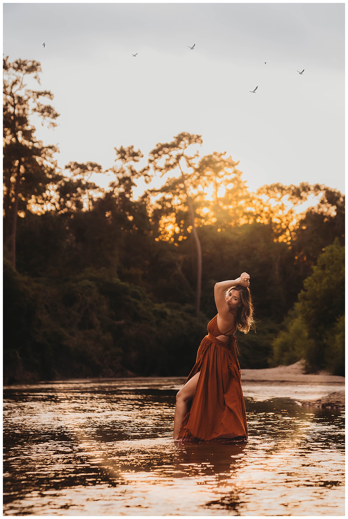 Woman shows off her pregnant belly showing the Perfect Time for Maternity Photos