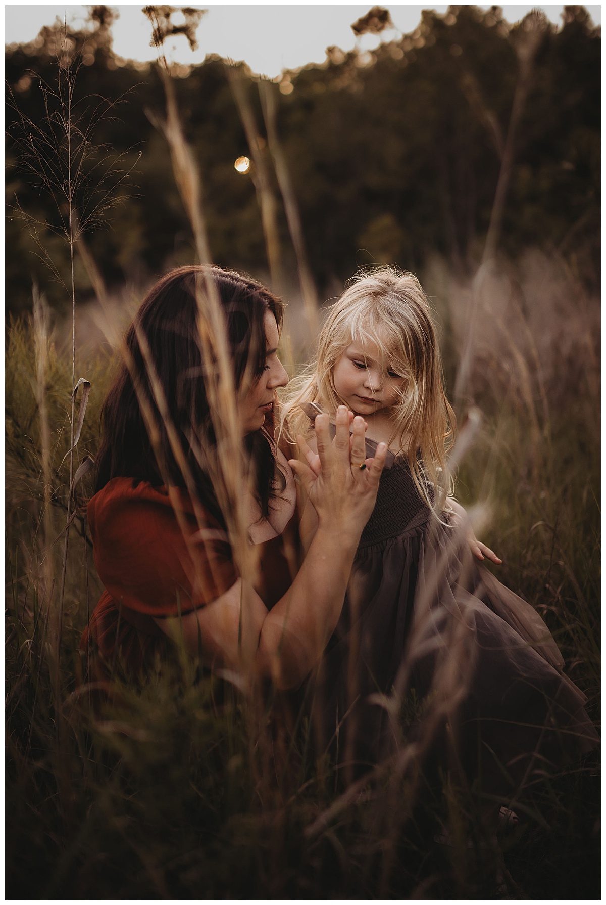 Mom and daughter sit together for Maria Grace Photos