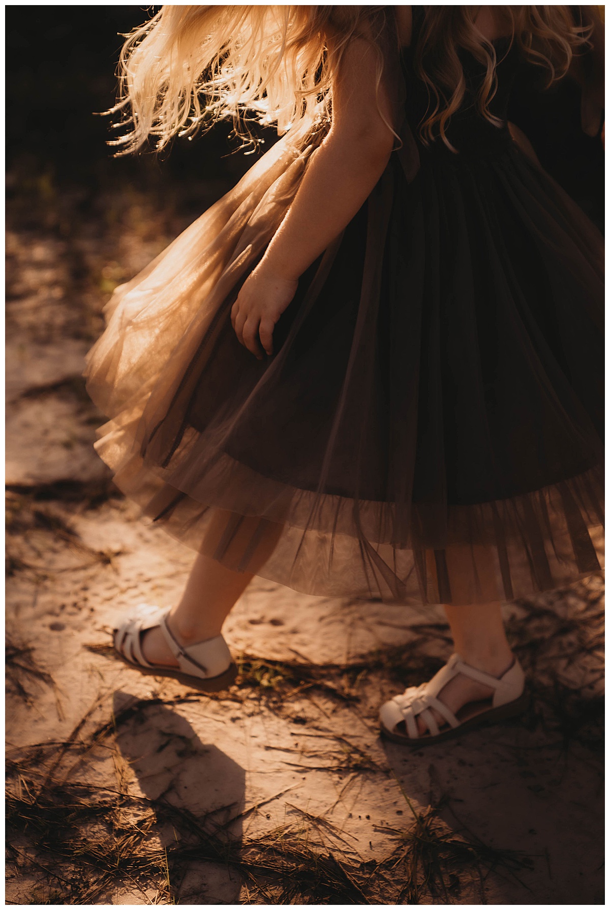 Little girl walks through the dirt for Maria Grace Photos