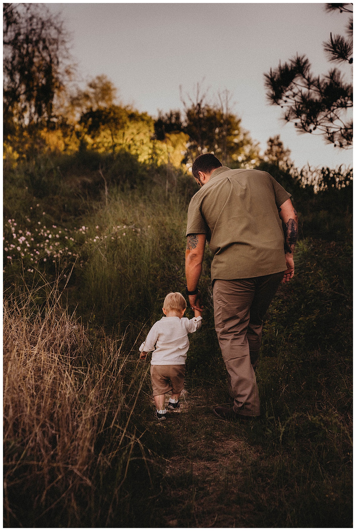 Dad and son walk together for Maria Grace Photos