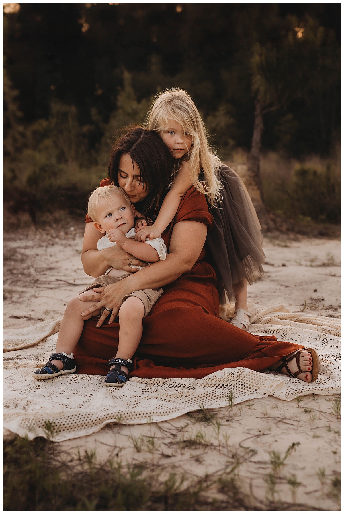 Kids give their mom a big hug following my suggestion of Golden Hour for Family Photos