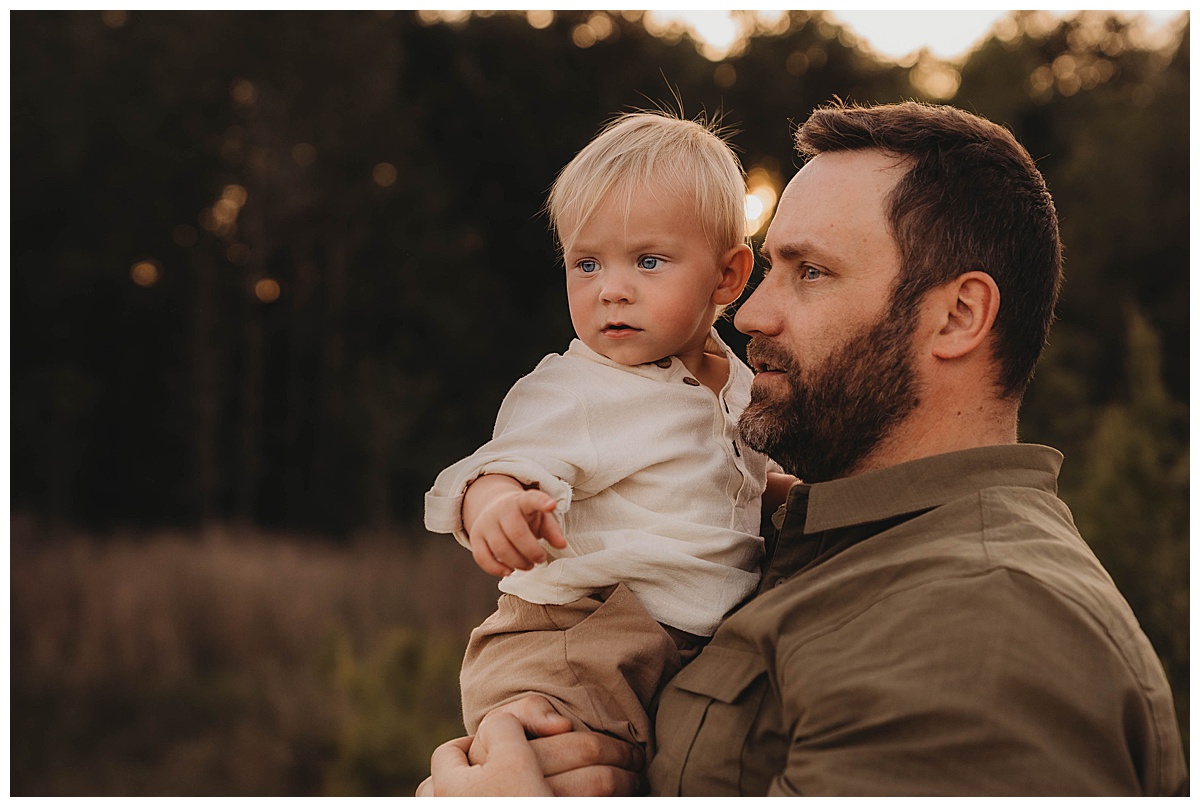 Father and son hold each other close following a my suggestion of Golden Hour for Family Photos