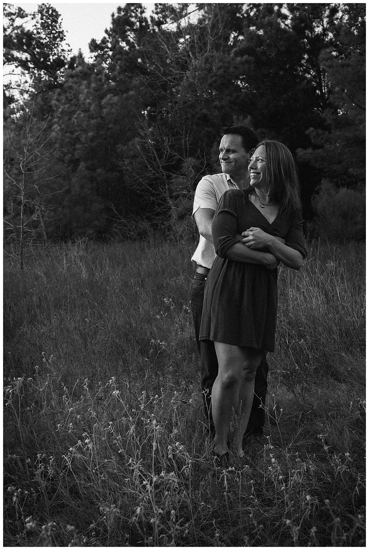 Parents hold each other close for Maria Grace Photos