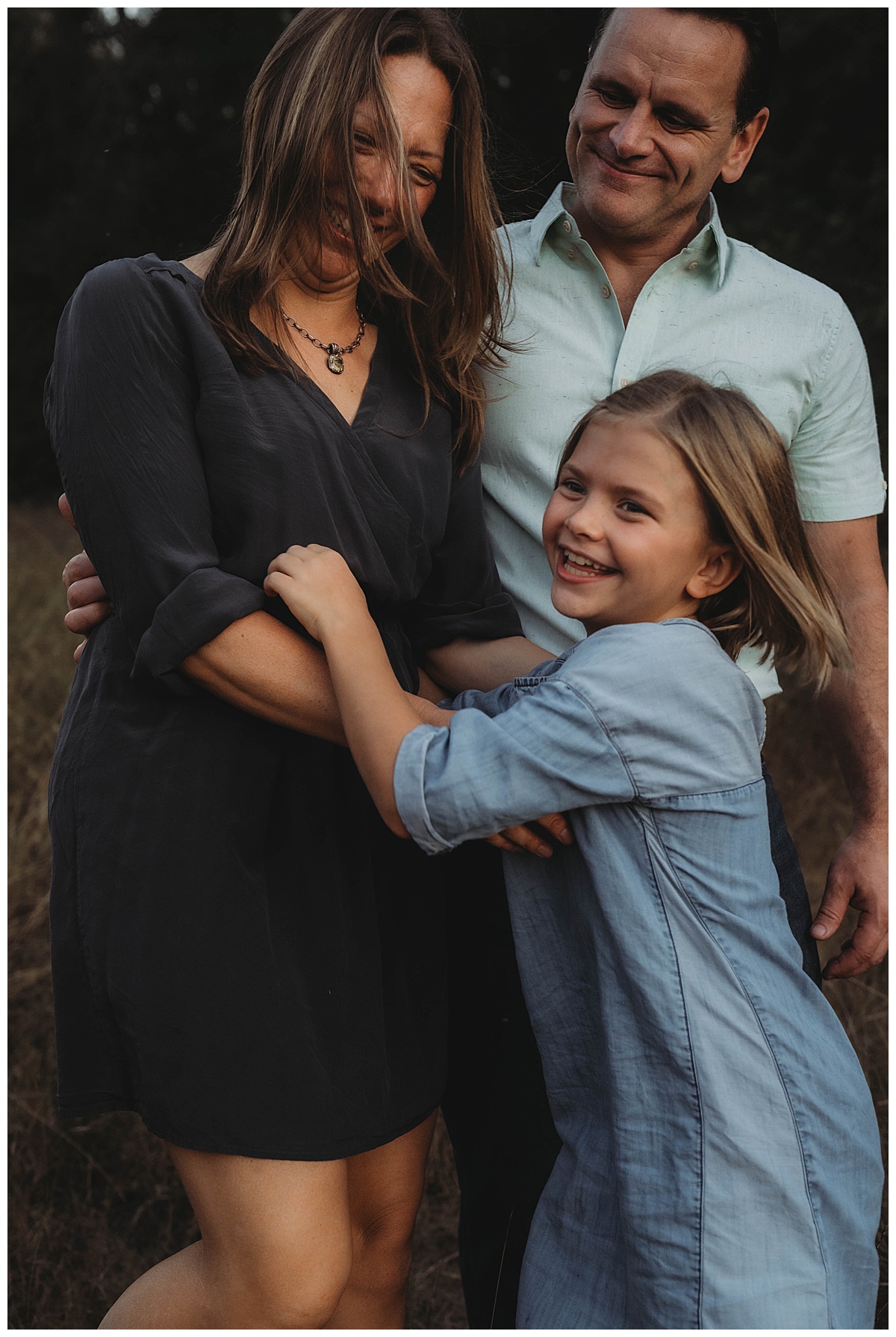 Parents smile with kids for Maria Grace Photos