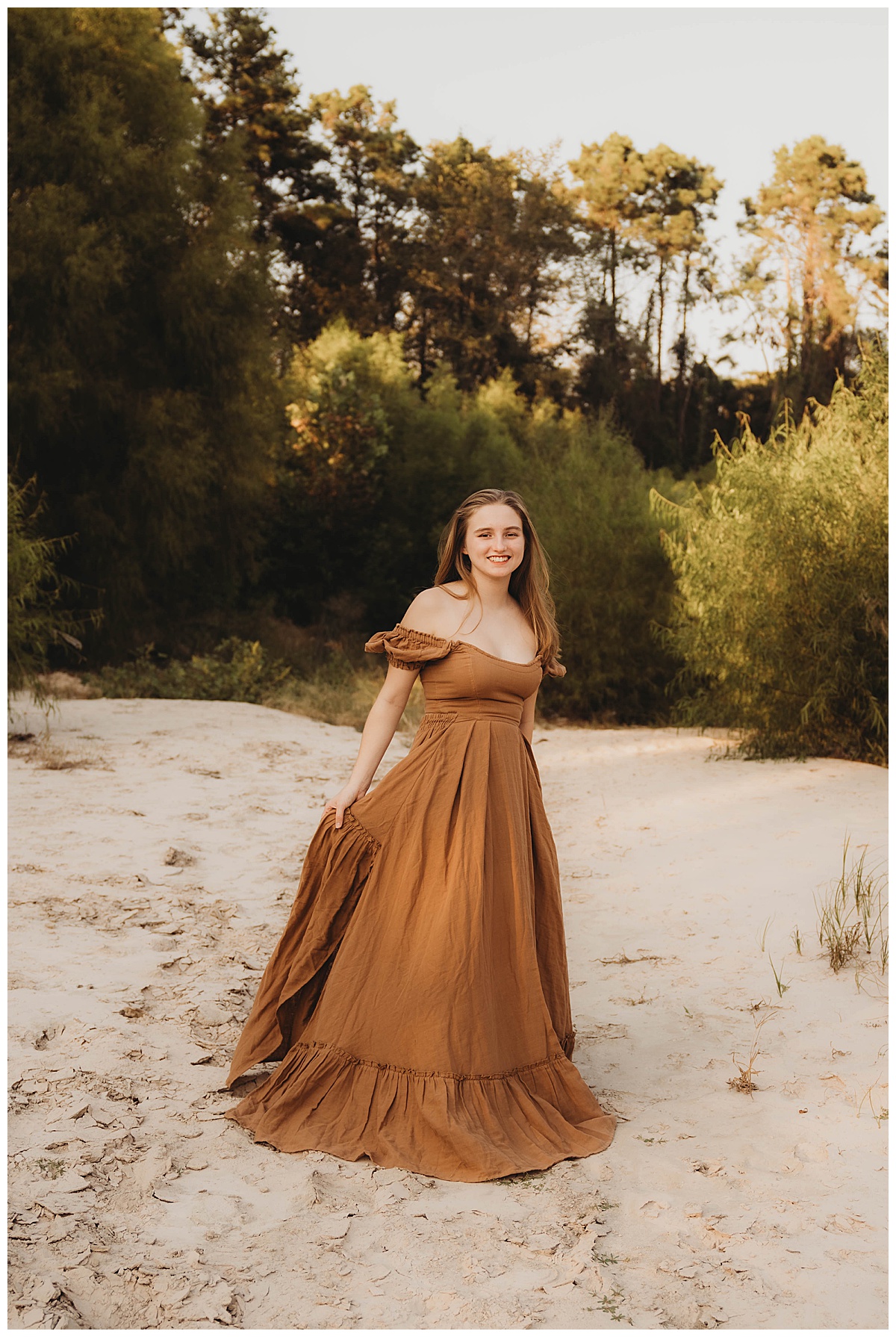 Woman twirls in dress The Woodlands Family Photographer