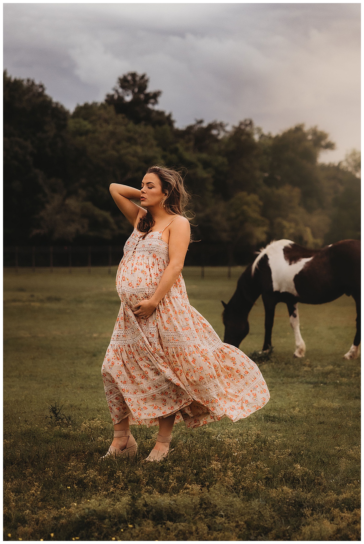 Mom holds her pregnant belly Embracing Imperfection during family photos 