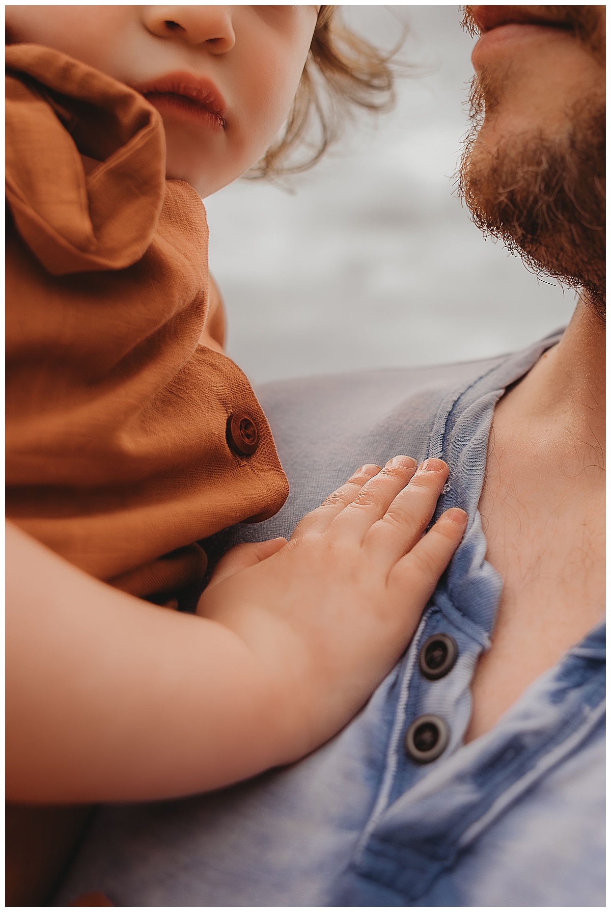 Daughter rests her hand on father for Maria Grace Photos