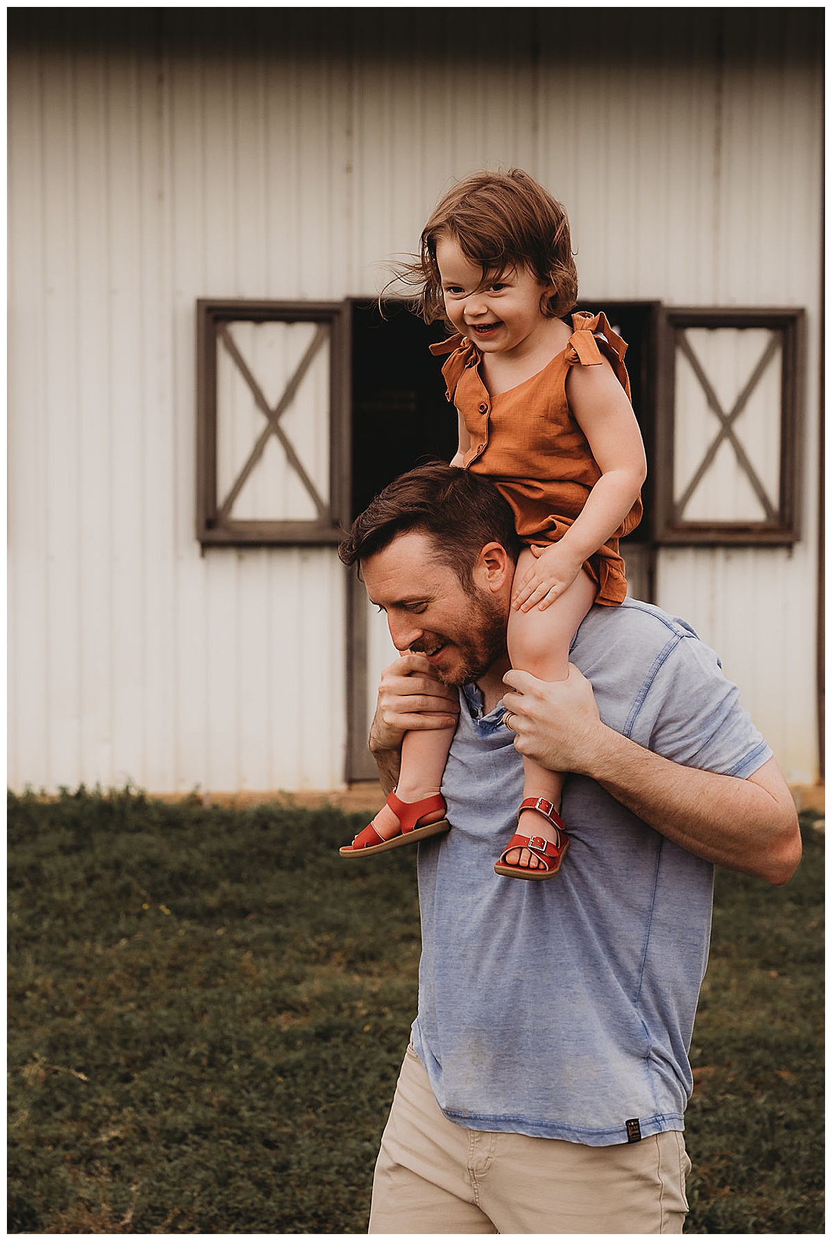 Daughter rides on dad's shoulders for Maria Grace Photos